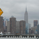 The Empire State Building rises over empty piers on the East River on March 25, 2020 in New York.